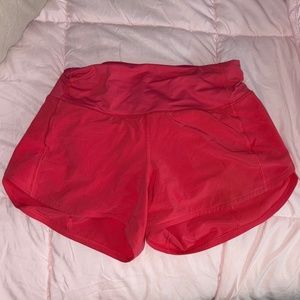 lululemon 4 inch high rise speed up shorts in lip gloss